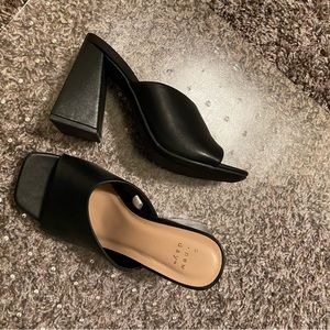 Black leather heeled sandals